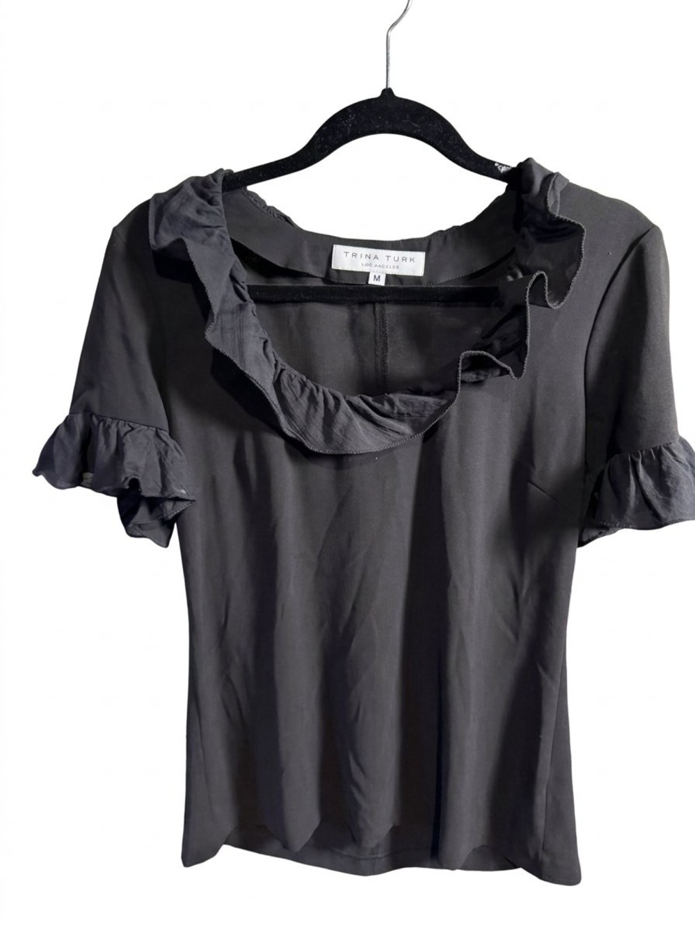 Trina Turk Black Ruffle Neck Short Sleeve Top / M / good condition/ Ptp-18”